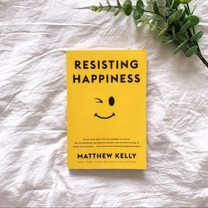 Resisting Happiness Paperback Book